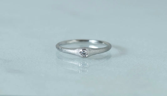 Cradle ring + diamond / Pt900