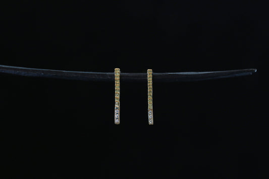 Unknown knowns line earrings + diamond